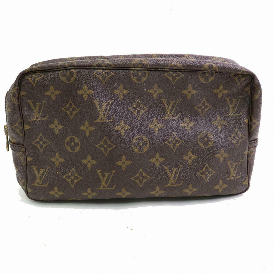 Authentic Louis Vuitton Monogram Cosmetic Pouch: Brand: Louis Vuitton Material: Monogram Style: Cosmetic Pouch Color: Browns Size(inch): W11.0 inch(approx) /28 cm(approx) x H6.69 inch(approx) /17 cm(approx) x D3.14 inch(approx) /8 cm(approx) " Count