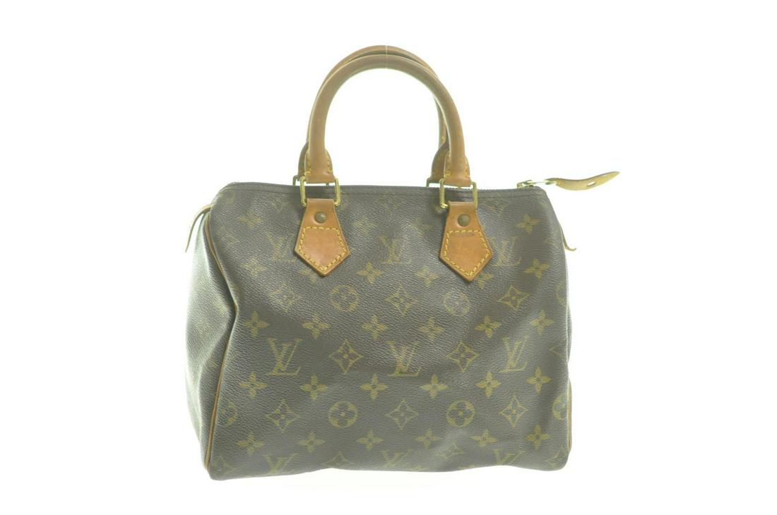 LOUIS VUITTON Monogram Speedy 25 Hand Bag: Brand: LOUIS VUITTON Style: Hand Bag Material: Monogram Canvas Color: Monogram Size (Inches): W10 x H7.5 x D6"(Approx) Exterior Condition: Monogram Canvas : lose shape, rubbing Leather : sun burn, sta