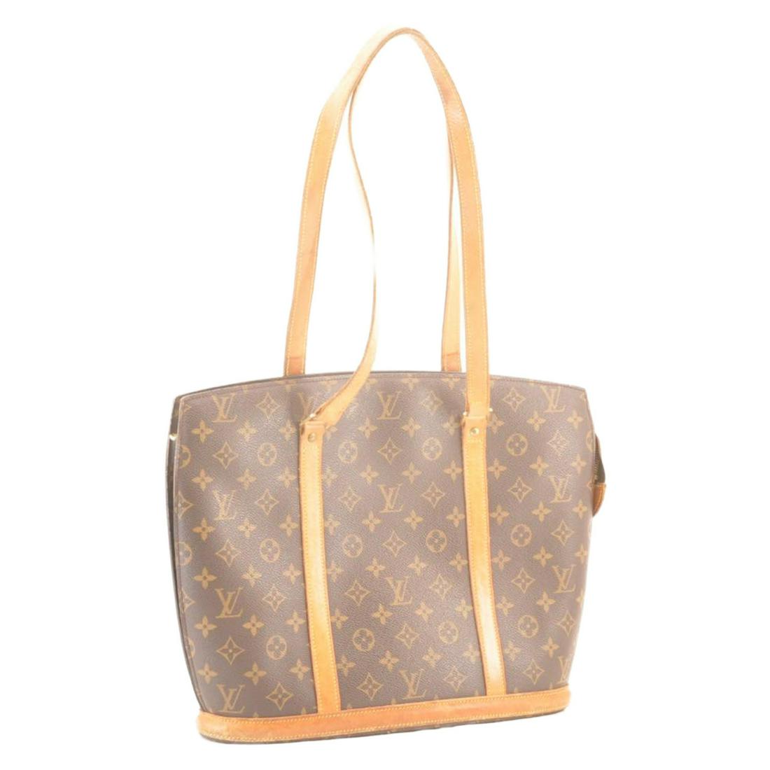 LOUIS VUITTON Monogram Babylone Tote: Brand: LOUIS VUITTON Style: Tote Bag Material: Monogram Canvas Color: Monogram Size (Inches): W15.7 x H11.8 x D4.3"(Approx) Exterior Condition: Monogram Canvas : minor lose shape, rubbing Leather : su
