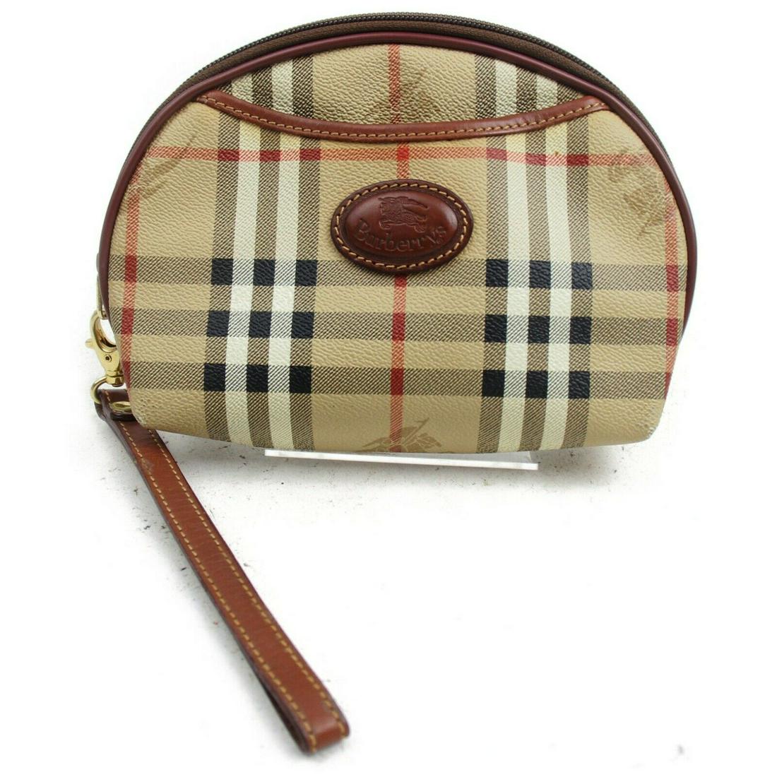 Authentic BURBERRYs PVC Accessories Pouch: Brand: Burberrys Material: PVC Style: Accessories Pouch Color: Browns Size(inch): W7.48 inch(approx) /19 cm(approx) x H5.11 inch(approx) /13 cm(approx) x D1.96 inch(approx) /5 cm(approx) " All Bidhaus