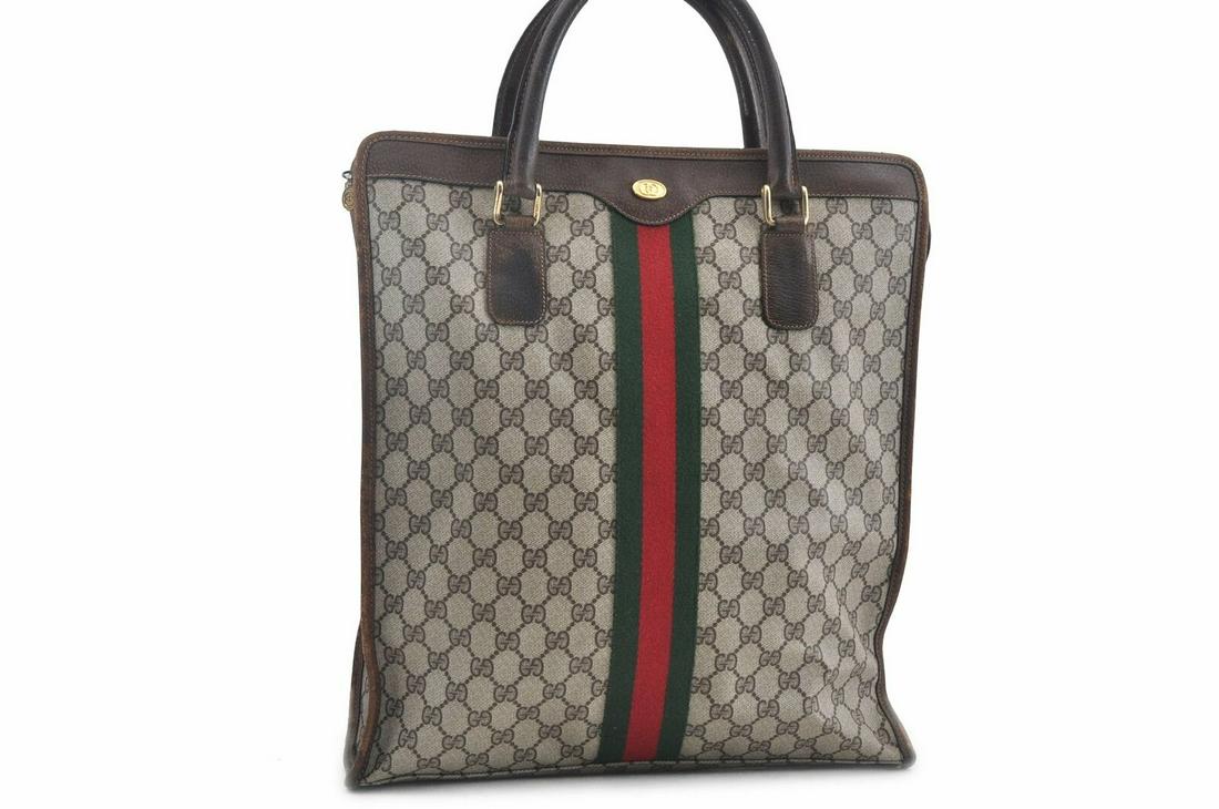 Authentic GUCCI Tote: Brand: GUCCI Material: PVC Style: Tote Bag Color: Brown Country of Origin: Italy All Bidhaus items come with a 100% money-back authenticity guarantee. Please refer to images carefully for condition de