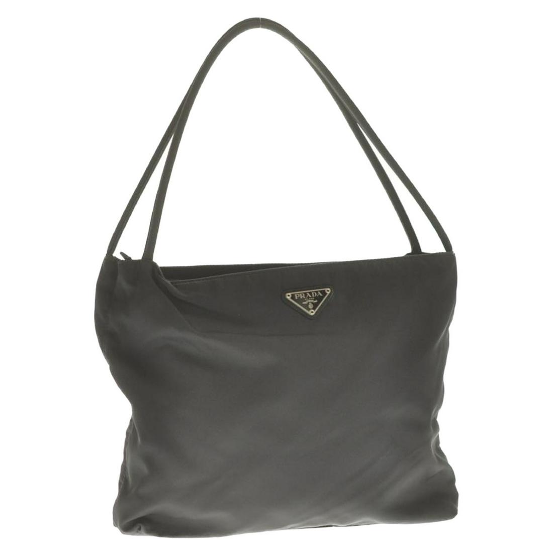 Authentic Prada Nylon Shoulder Bag: Brand: Prada Style: Shoulder Bag Material: Nylon Color: Black Size (Inches): W11.02 X H9.84 X D2.75" / Shoulder Drop 7.87"(Approx) Exterior Condition: Nylon : Minor Loose Shape, Rubbing, Partial Signs
