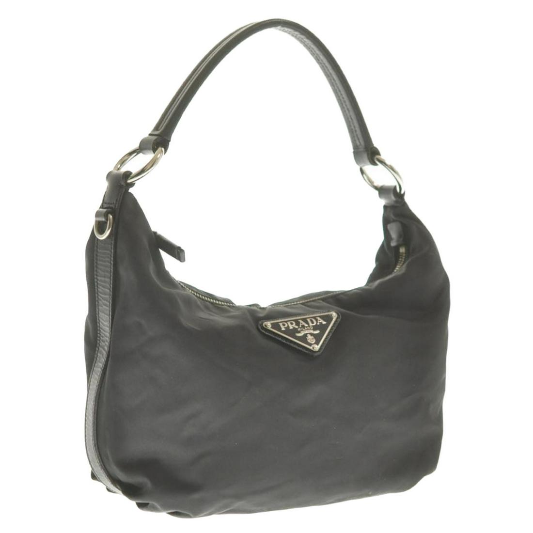 Authentic Prada Nylon Shoulder Bag: Brand: Prada Style: Shoulder Bag Material: Nylon Color: Black Size (Inches): W9.84 X H7.08 X D2.36" / Shoulder Drop 7.48"(Approx) Exterior Condition: Nylon : Minor Rubbing, Signs Of Age Leather : Sun 