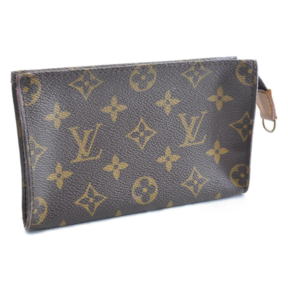 Authentic LOUIS VUITTON Monogram Bucket PM: Brand: LOUIS VUITTON Material: Monogram Canvas Style: Pouch Color: Monogram Size(inch): W6.4 x H4.13 x D0.59inch(Approx) Country of Origin: France Accessory: There is no item box and dust bag. We will