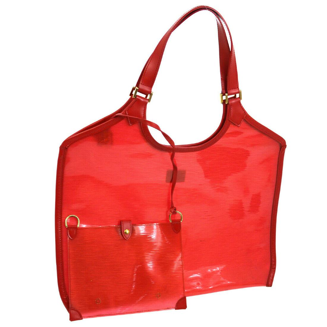 Authentic LOUIS VUITTON Vinyl Tote: Brand: LOUIS VUITTON Material: Vinyl, Leather, Vinyl Style: Tote Color: Red Size(inch): W19.1 x H13.0 x D0.6 " / Strap Drop: 9.8 Country of Origin: Spain Come with: Pouch All Bidhaus items come with a