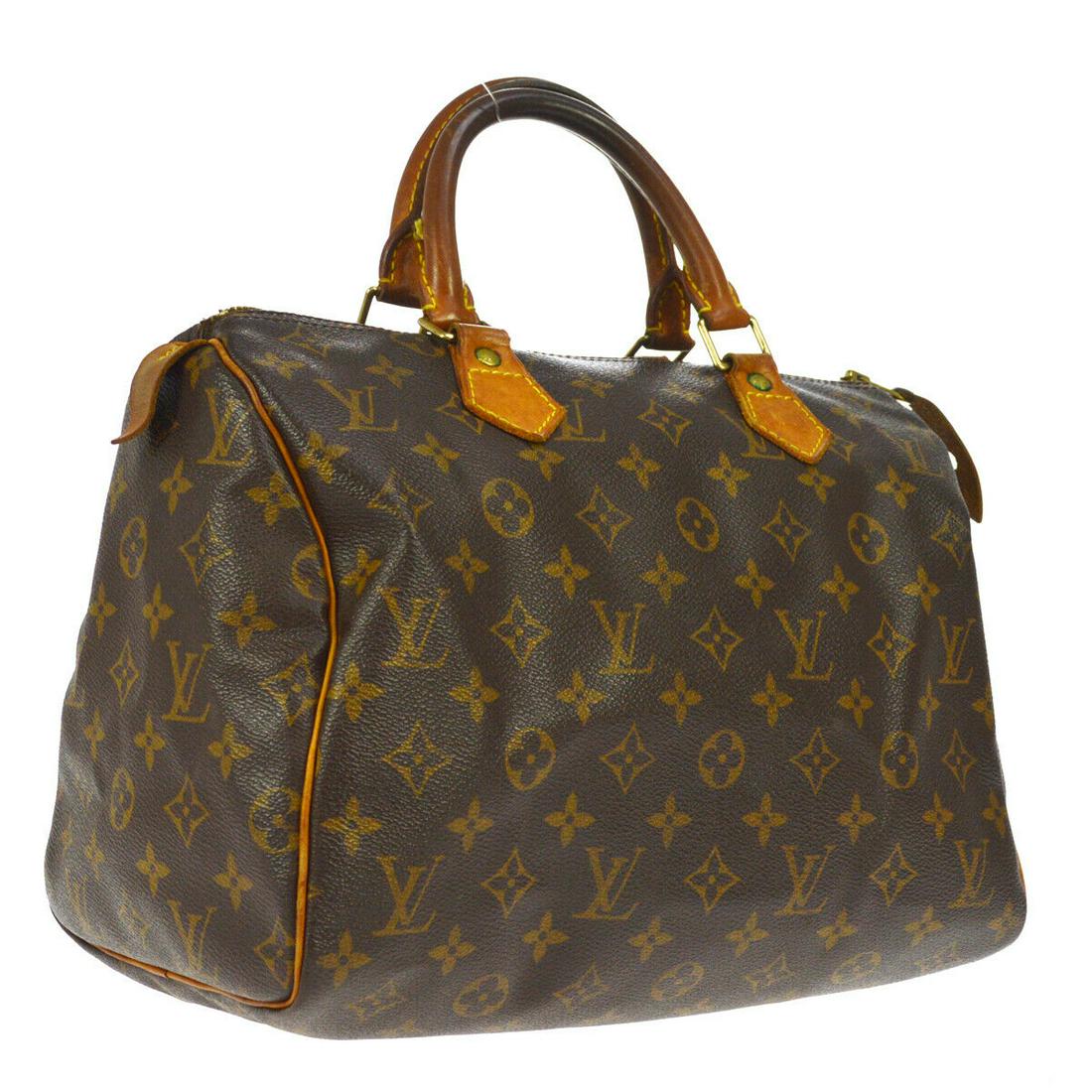 Authentic LOUIS VUITTON Speedy 30 Hand Bag: Brand: LOUIS VUITTON Material: Monogram Canvas, Leather Style: Hand Bag Color: Brown Size(inch): W11.8 x H8.3 x D6.7 " Country of Origin: France Come with: - All Bidhaus items come with a 100% money-b