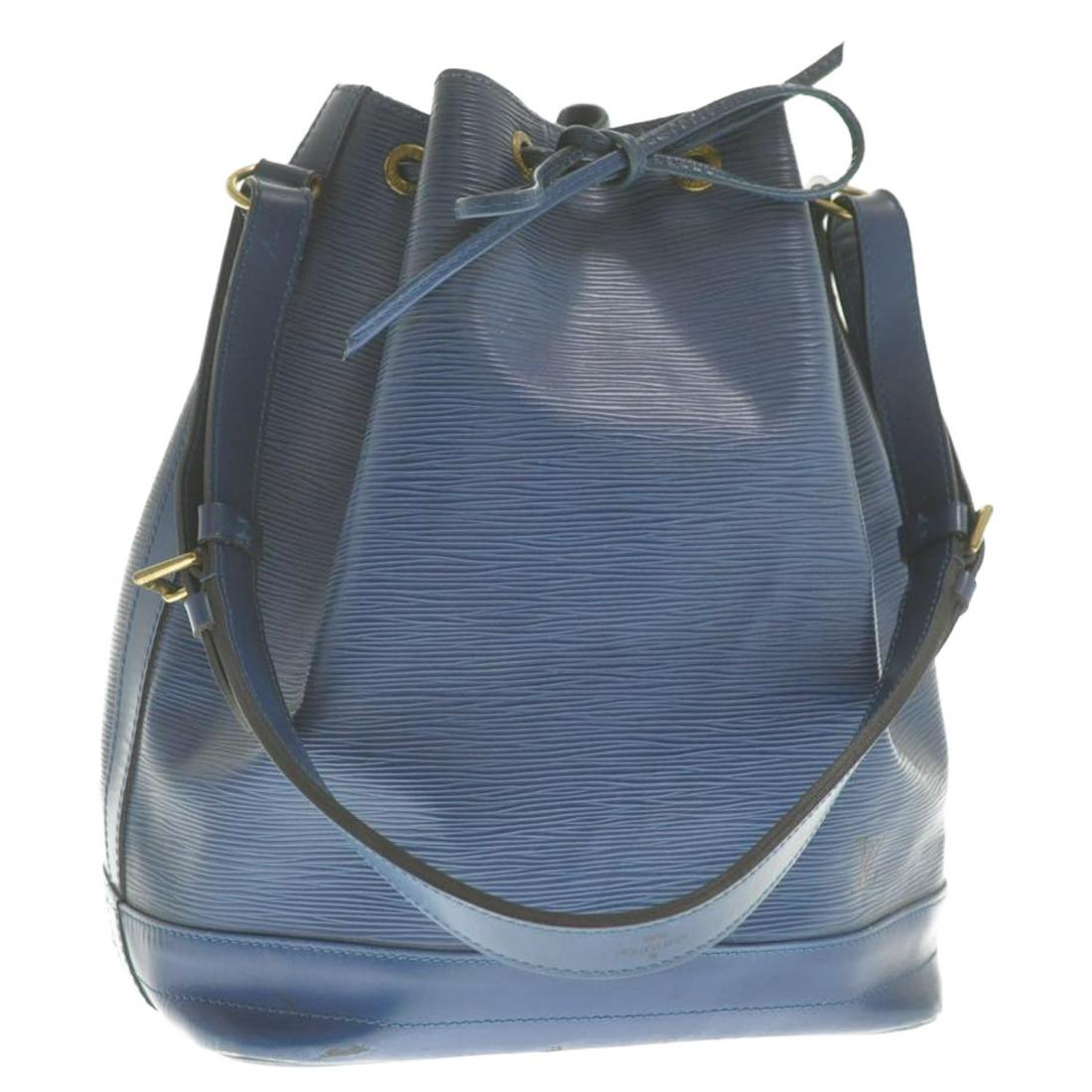 Authentic Louis Vuitton Epi Noe Blue Shoulder Bag: Brand: Louis Vuitton Style: Shoulder Bag Material: Epi Leather Color: Blue Size (Inches): W10.6 X H13.3 X D7.6"(Approx) Exterior Condition: Epi Leather : Minor Loose Shape, Rubbing, Scratches String :