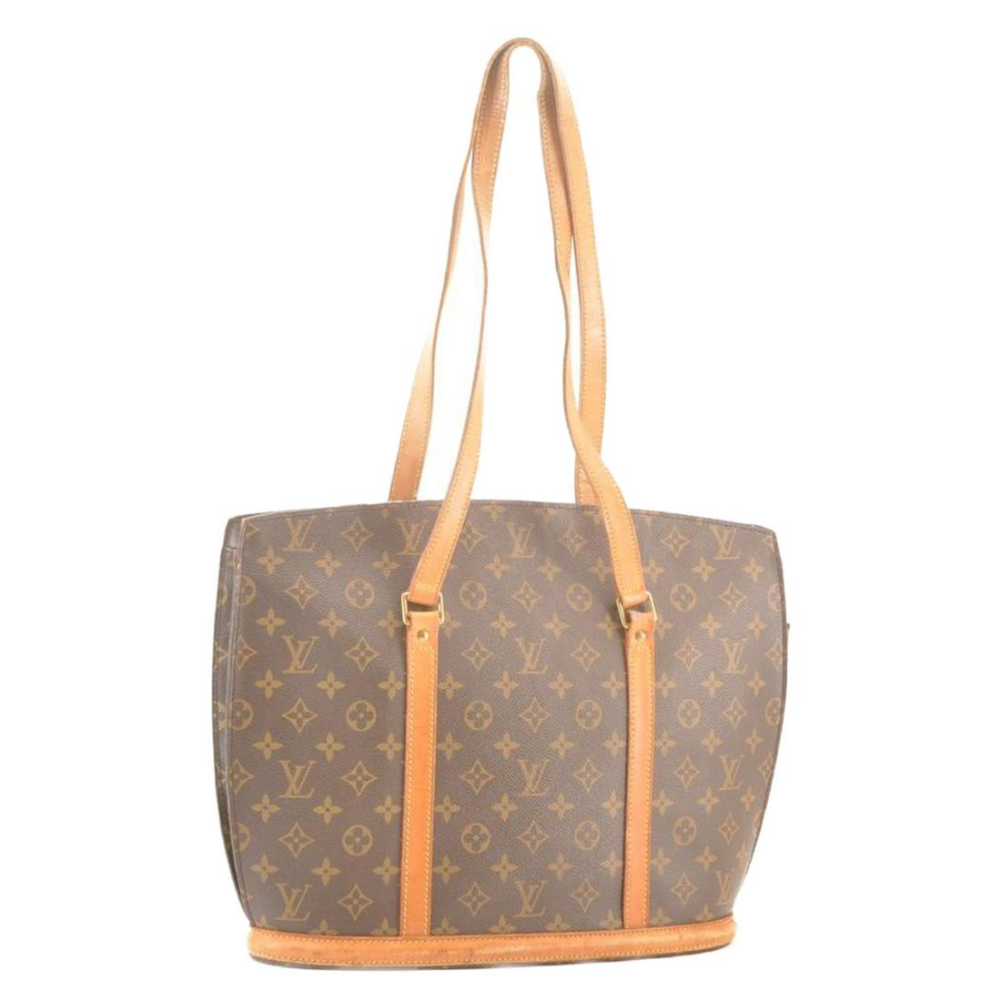 Authentic Louis Vuitton Monogram Babylone Tote Bag: Brand: Louis Vuitton Style: Tote Bag Material: Monogram Canvas Color: Monogram Size (Inches): W15.7 X H11.8 X D4.3"(Approx) Exterior Condition: Monogram Canvas : Loose Shape, Minor Rubbing Leather : S