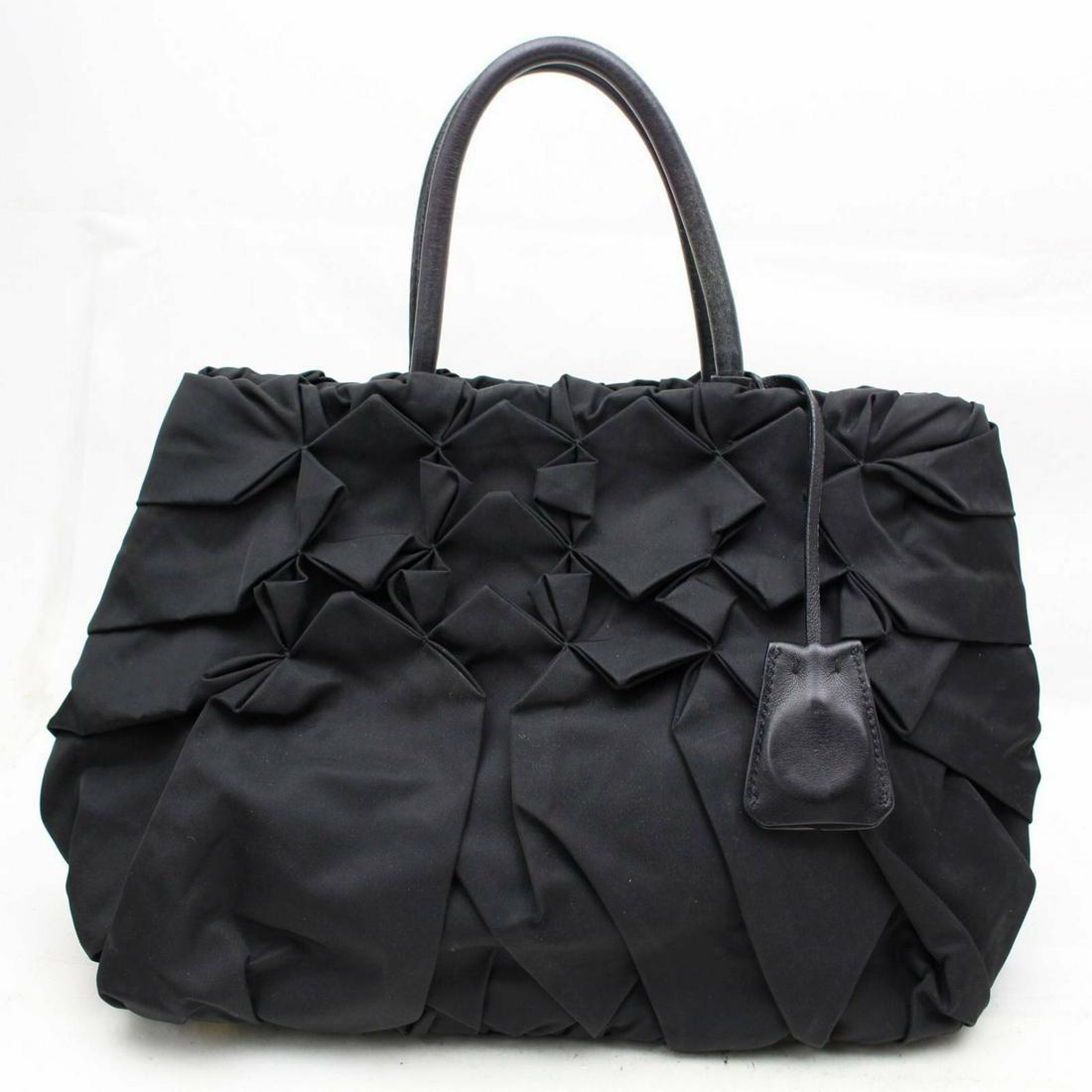 Authentic PRADA Nylon Tote: Brand: PRADA Material: Nylon Style: Tote Bag Color: Black Size(inch): W11.0 inch(approx) /28 cm(approx) x H9.84 inch(approx) /25 cm(approx) x D5.51 inch(approx) /14 cm(approx) " Country of Origin: Ita
