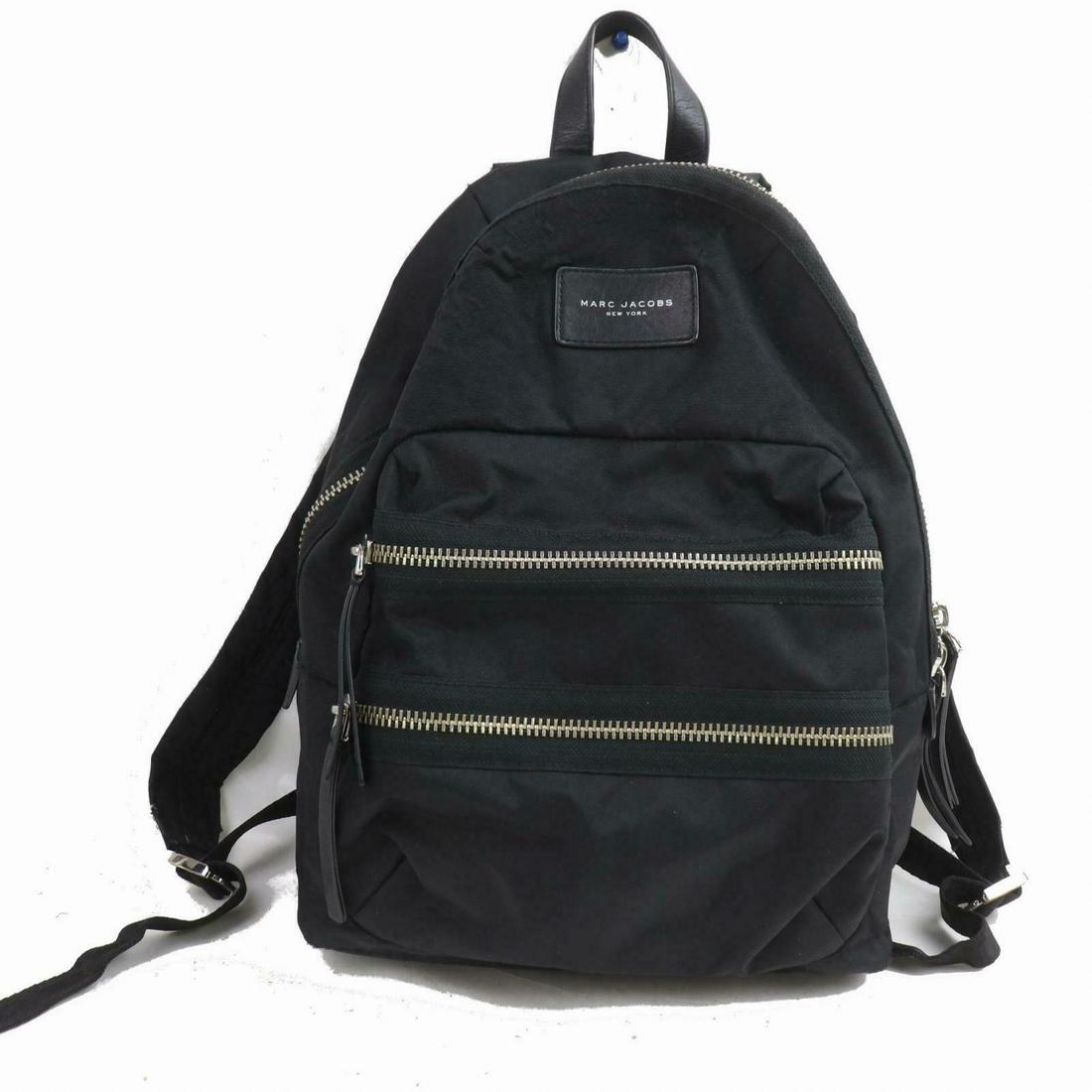 Authentic MARC JACOBS Nylon Back Pack: Brand: MARC JACOBS Material: Nylon Style: Back Pack Color: Black Size(inch): W11.8 inch(approx) /30 cm(approx) x H16.1 inch(approx) /41 cm(approx) x D5.11 inch(approx) /13 cm(approx) " / Strap Drop: S