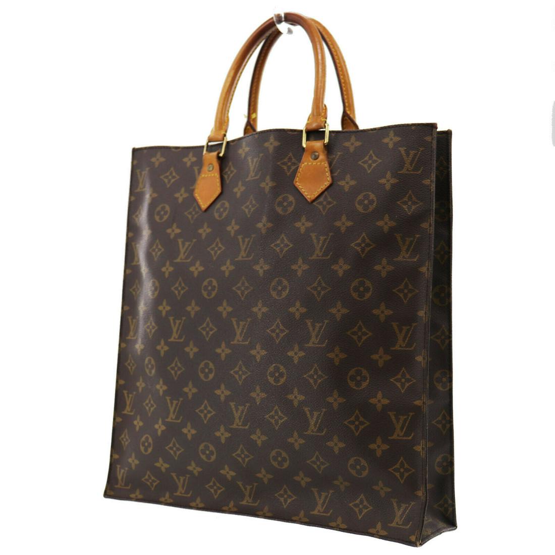 Authentic LOUIS VUITTON Sac Plat Tote Hand Bag: Brand: LOUIS VUITTON Material: Monogram Canvas Leather Style: Hand Bag Color: Brown Size(Inch): H 14.9 x D 3.5 x L 14.1 Handle : 14.1 Country of Origin: France Come with: All Bidhaus items come with a