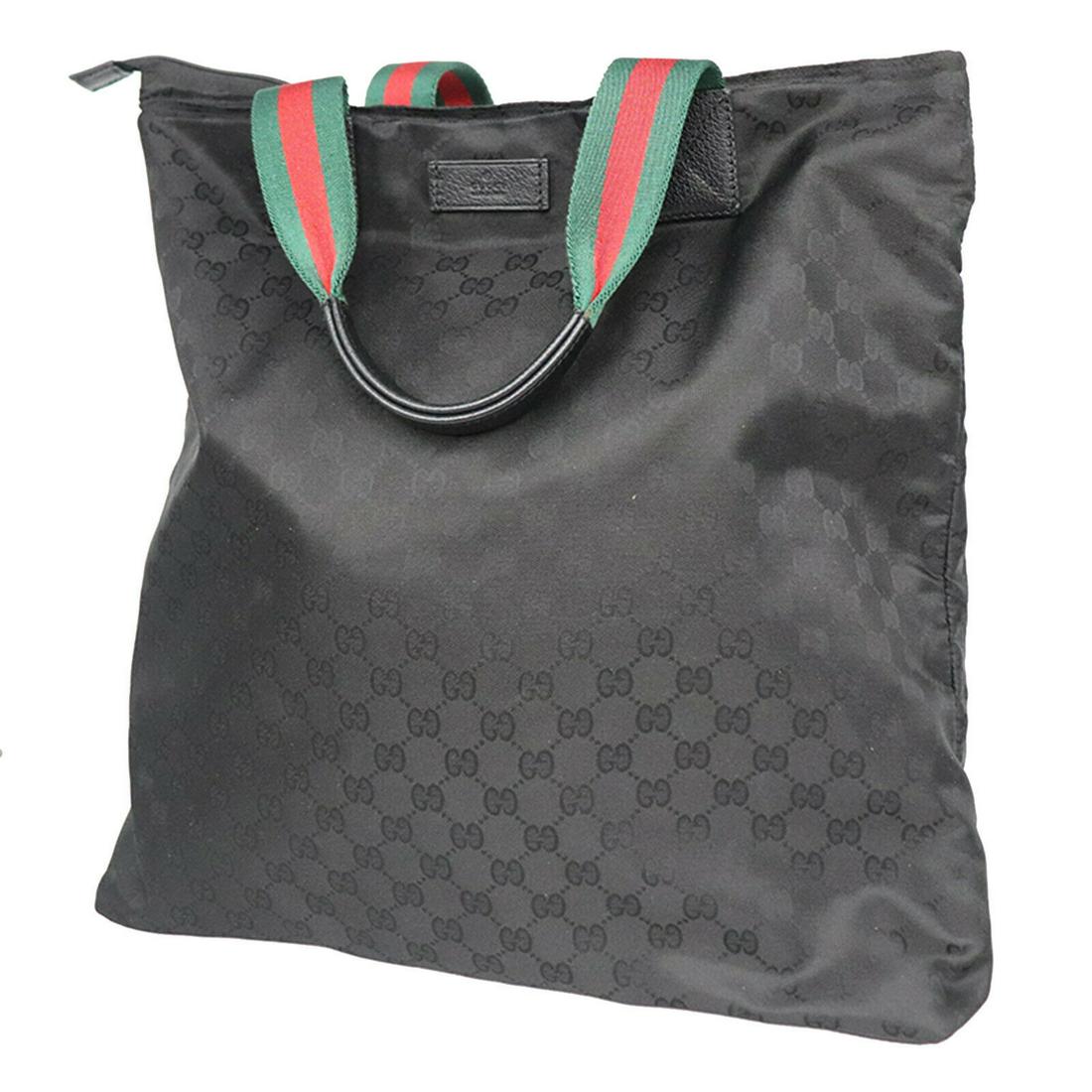 Authentic GUCCI GG Supreme Web Hand Bag: Brand: GUCCI Material: Canvas Style: Hand Bag Color: Black Size(Inch): H 16.5 x D 4.7 x L 16.5 Handle. 17.3 Country of Origin: Italy Come with: - All Bidhaus items come with a 100% money-back authenti