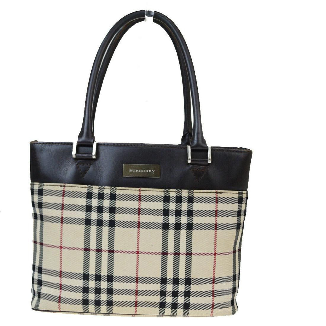 Authentic BURBERRY Nylon Leather Hand Bag: Brand: BURBERRY Material: Nylon Leather Style: Hand Bag Color: Beige Size(inch): W 9.1 x H 7.1 x D 3.1 "(approx.) Country of Origin: - Come with: - All Bidhaus items come with a 100% money-back authen