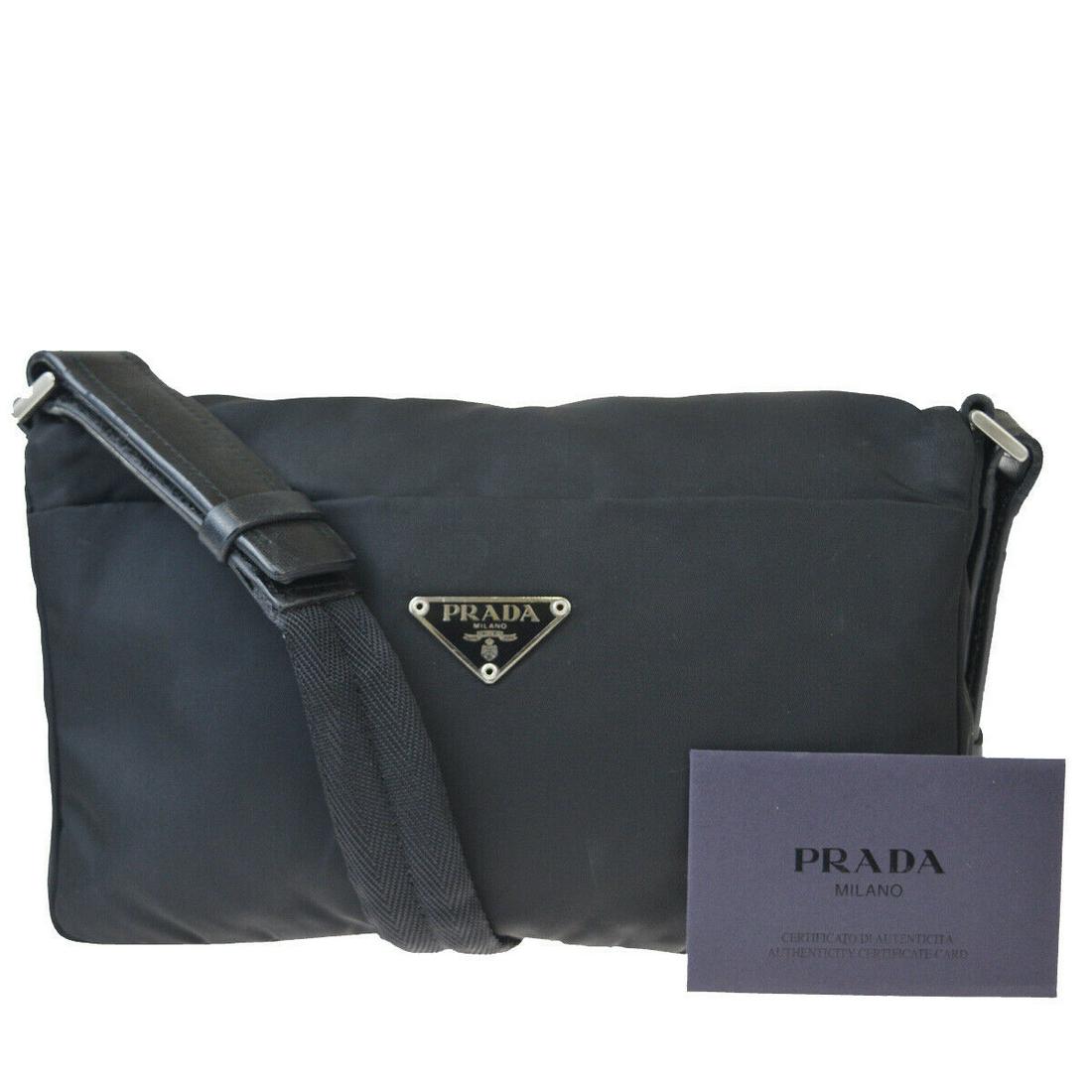 Authentic PRADA Leather, Nylon Shoulder bag: Brand: PRADA Material: Leather, Nylon Style: Shoulder bag Color: Black Size(inch): W 9.4 x H 5.5 x D 2 "(approx.) Country of Origin: Italy Come with: Authenticity Card All Bidhaus items come with a 10