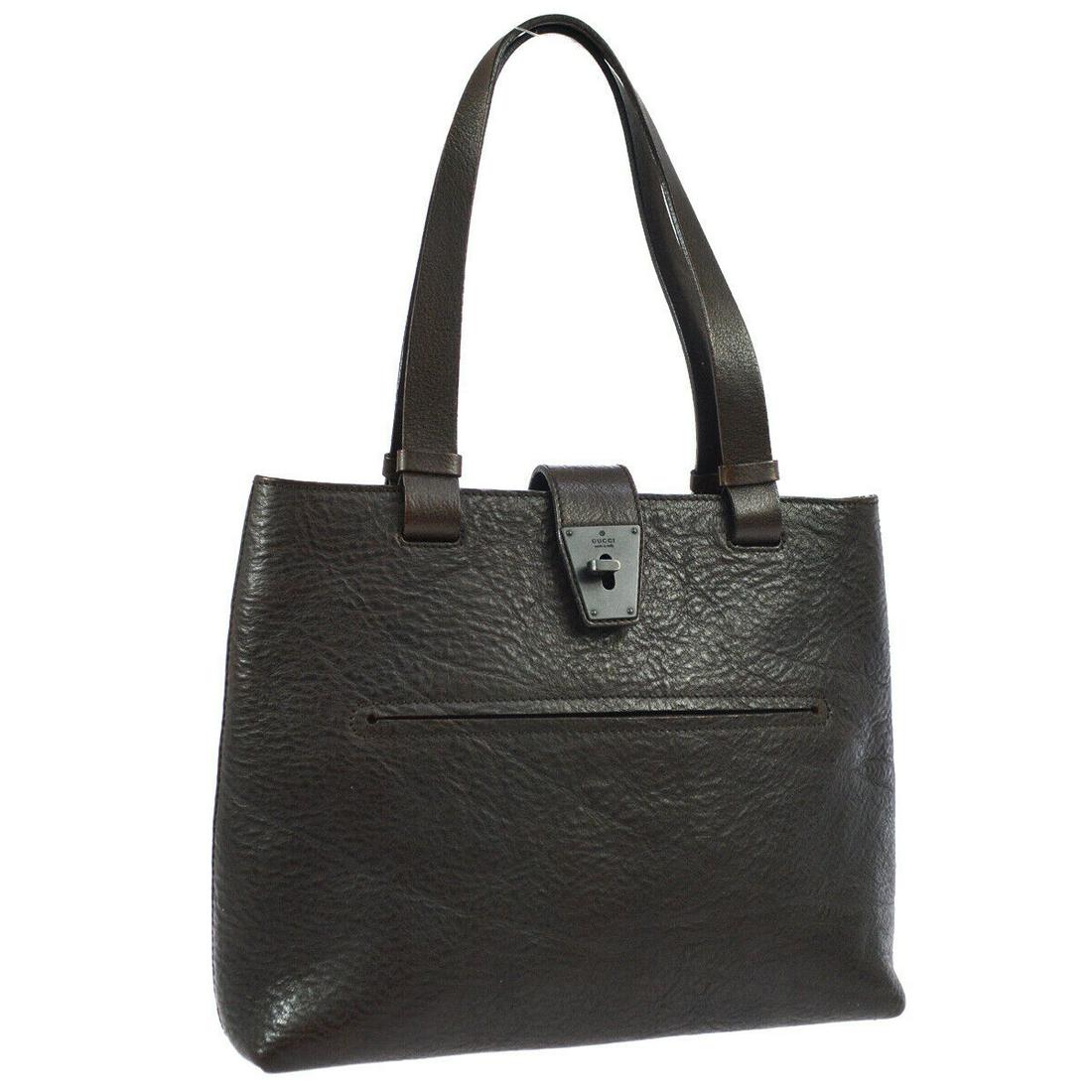 Authentic GUCCI Logos Shoulder Tote: Brand: GUCCI Material: Leather Style: Shoulder Tote Bag Color: Dark Brown Size(inch): W11.8 x H9.4 x D3.5 " / Strap Drop: 8.3 Country of Origin: Italy Come with: - All Bidhaus items come with a 100% m