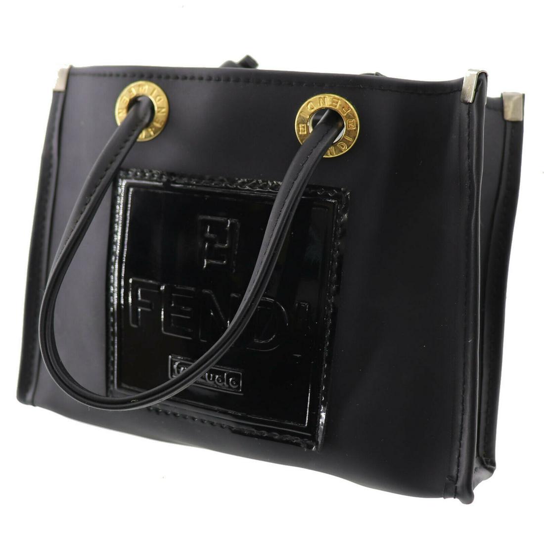 Authentic FENDI Fazzuolo Logos Mini Pouch Hand Bag: Brand: Fendi Material: Rubber Style: Pouch Color: Black Size(Inch): H 4.5 x D 1.9 x L 6.1 Handle. 9.4 Country of Origin: Unknown All Bidhaus items come with a 100% money-back authenticity guarantee. P