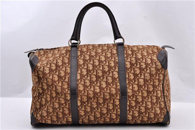 Authentic Christian Dior Trotter Canvas Hand Bag: Brand: Christian Dior Material: Canvas Style: Hand Bag Color: Brown Size(inch): W15.7 x H8.5 x D7.3" / Handle Drop 3.9"(Approx) Country of Origin: France Accessory: There is no ItemBox and DustBag.We 