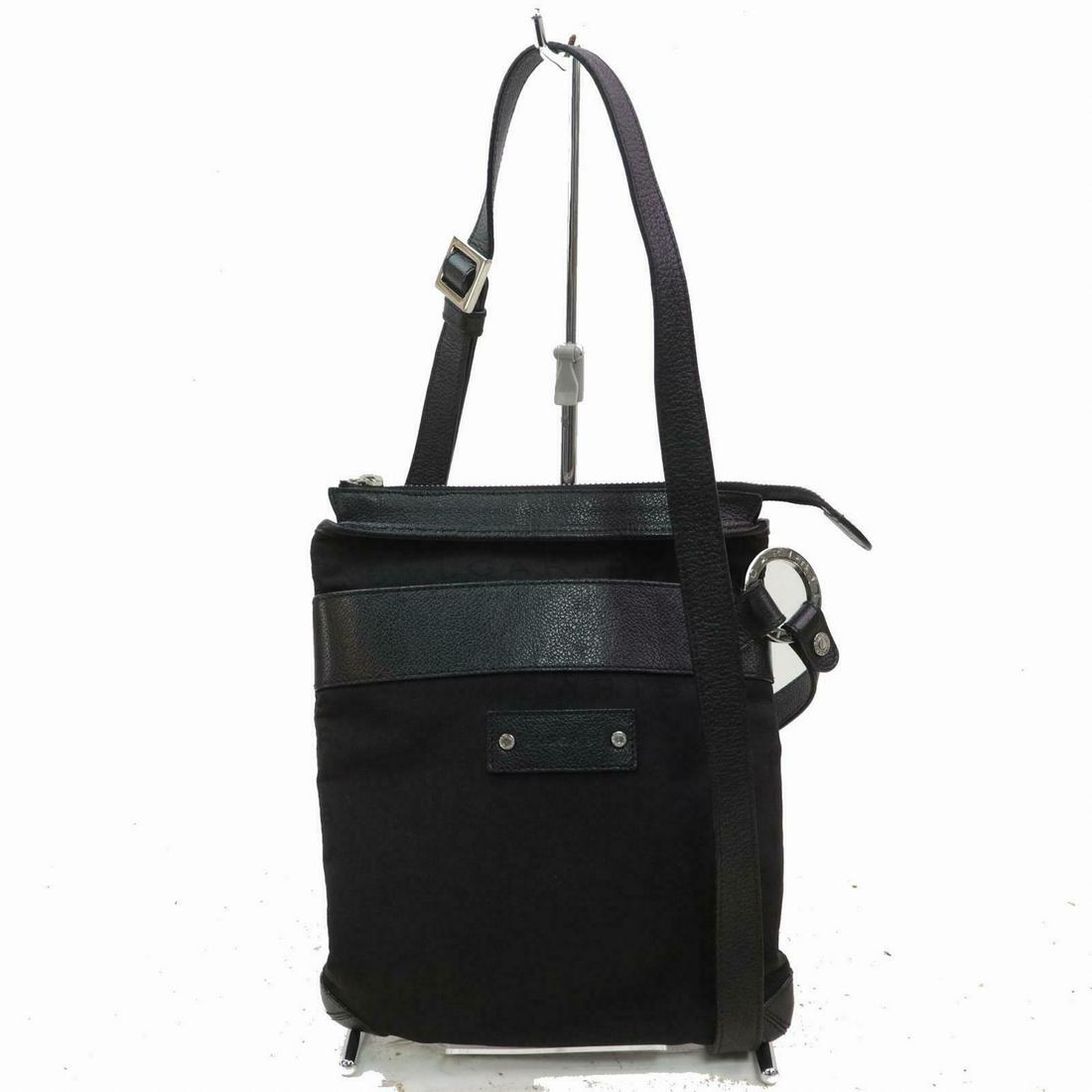 Authentic BVLGARI Canvas Shoulder Bag: Brand: BVLGARI Material: Canvas Style: Shoulder Bag Color: Black Size(inch): W7.87 inch(approx) /20 cm(approx) x H9.44 inch(approx) /24 cm(approx) x D0 inch(approx) / cm(approx) " / Strap Drop: Should