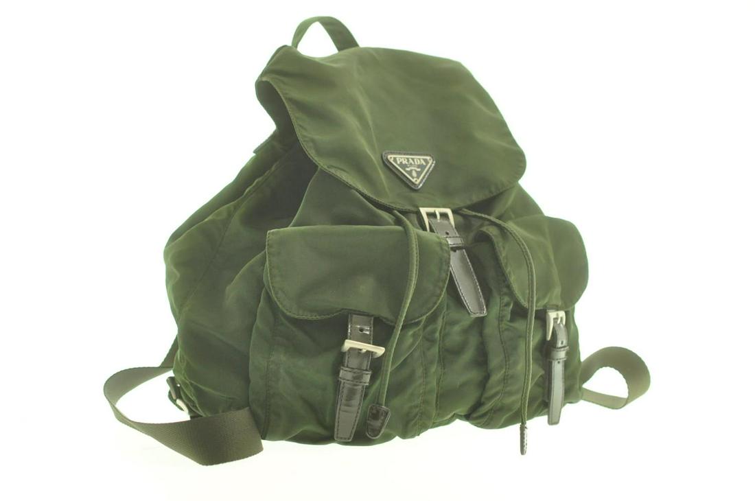Authentic PRADA Nylon Backpack: Brand: PRADA Material: Nylon Style: Backpack Color: Green Size(inch): W12.2 x H11.41 x D5.51inch(Approx) Country of Origin: Italy Accessory: Guarantee Card All Bidhaus items come with a 100% money-bac