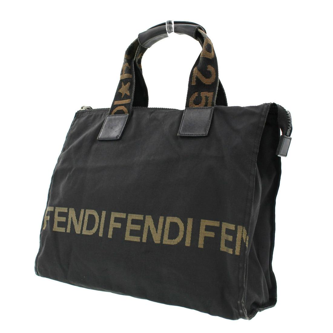 Authentic FENDI Logo Hand Tote: Brand: Fendi Material: Nylon Canvas Style: Hand Bag Color: Black Size(Inch): H 10.2 x D 5.1 x L 12.0 Handle: 12.9 Country of Origin: Italy Come with: - All Bidhaus items come with a 100% money-back au