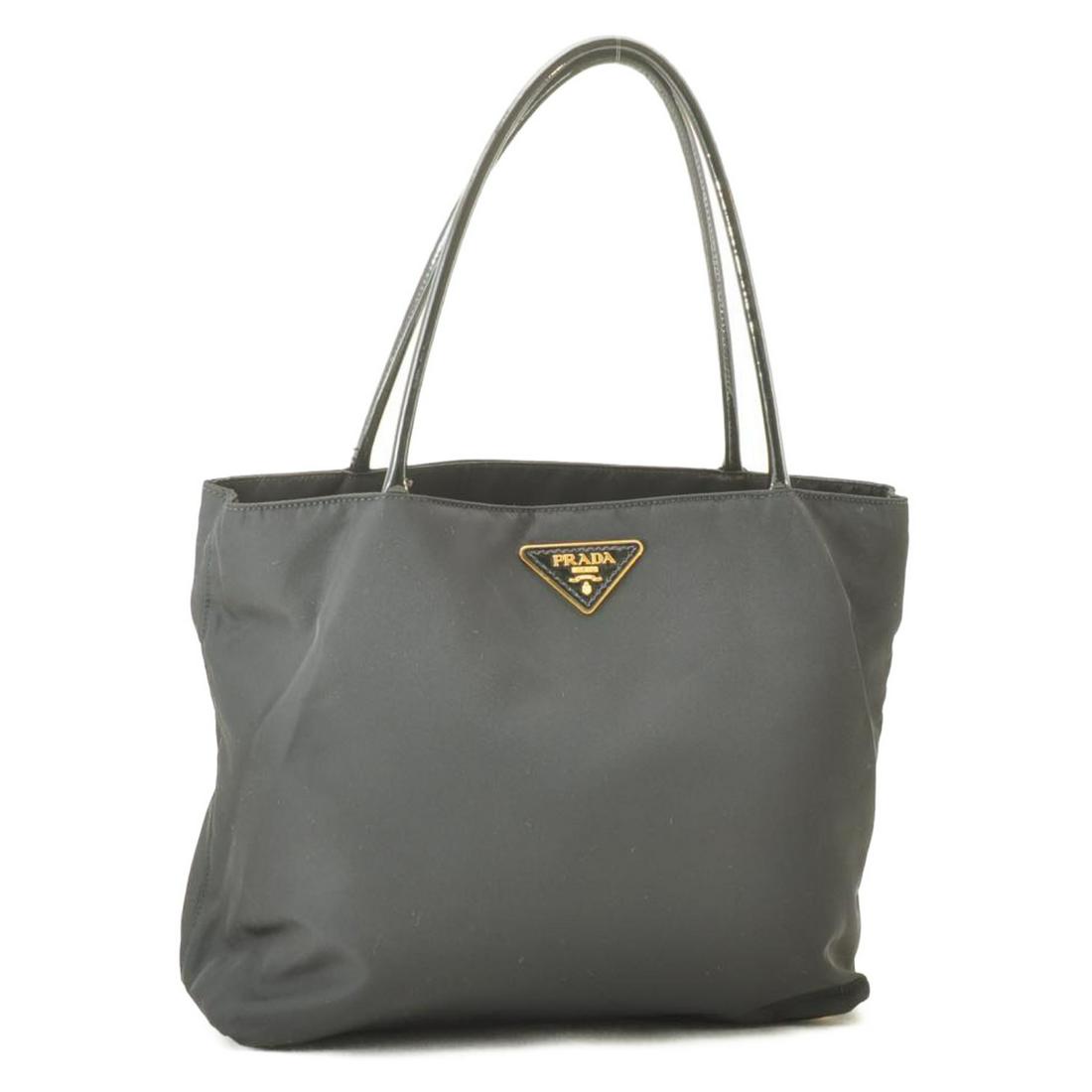 Authentic PRADA Nylon Tote Bag Black Auth rd203: Brand: PRADA Material: Nylon Style: Tote Bag Color: Black Size(inch): W12.2 x H10.62 x D5.11inch / Shoulder Drop 7.87inch(Approx) Country of Origin: Italy Accessory: There is no item box and dust bag.
