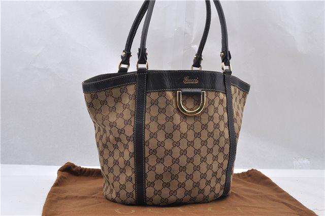 Authentic GUCCI Shoulder Tote Bag Canvas: Brand: GUCCI Material: Canvas Style: Tote Bag Color: Brown Size(inch): W9.3-16.9 x H12 x D4.3"/ Strap Drop 9.4"(Approx) Country of Origin: Italy Accessory: DustBag All Bidhaus items come with a 100% m