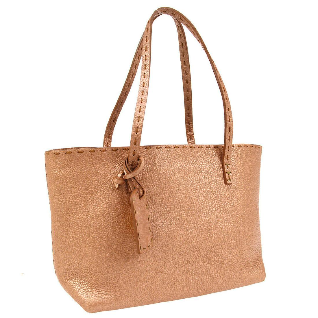 Authentic FENDI SELLERIA Logos Hand Bag: Brand: FENDI Material: Leather Style: Hand Bag Color: Metallic Pink Size(inch): W9.1 x H6.9 x D4.3 " / Strap Drop: 6.7 Country of Origin: Italy Come with: Dust Bag All Bidhaus items come with a 100% m