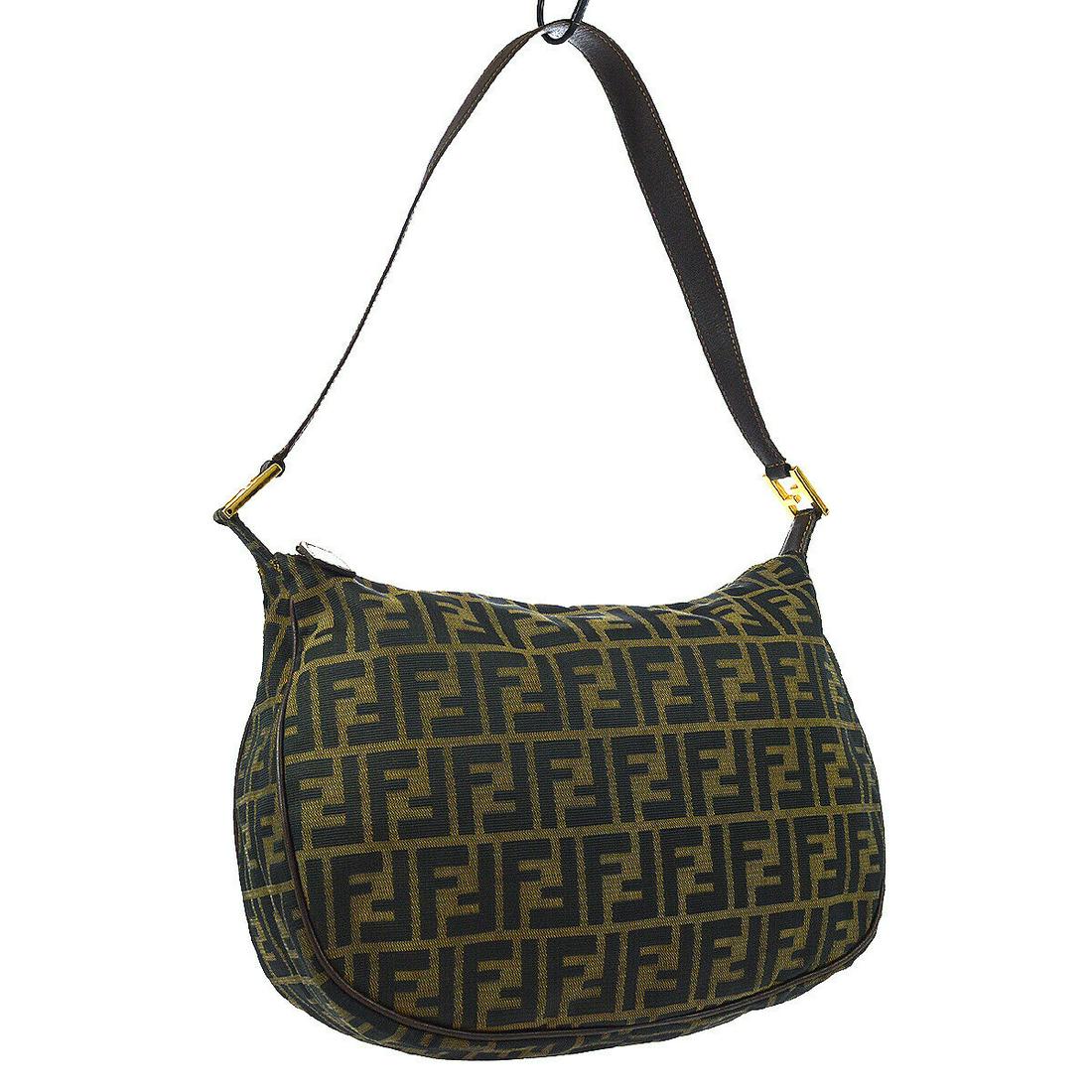 Authentic FENDI Zucca Pattern Shoulder Bag: Brand: FENDI Material: Canvas, Leather Style: Shoulder Bag Color: Brown Size(inch): W12.6 x H11.4 x D4.7 " / Strap Drop: 11.8 Country of Origin: Italy Come with: - All Bidhaus items come with a 100% m