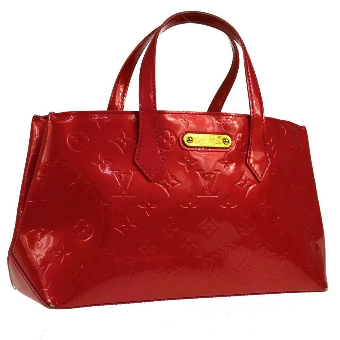 Authentic LOUIS VUITTON VERNIS WILSHIRE PM HAND TOTE: Brand: LOUIS VUITTON Material: Patent Leather Style: Totes & Shoppers Color: Rose Pop Size(inch): W7.1 x H11.8 x D4.3 " Country of Origin: France Come with: - All Bidhaus items come with a 100% money-