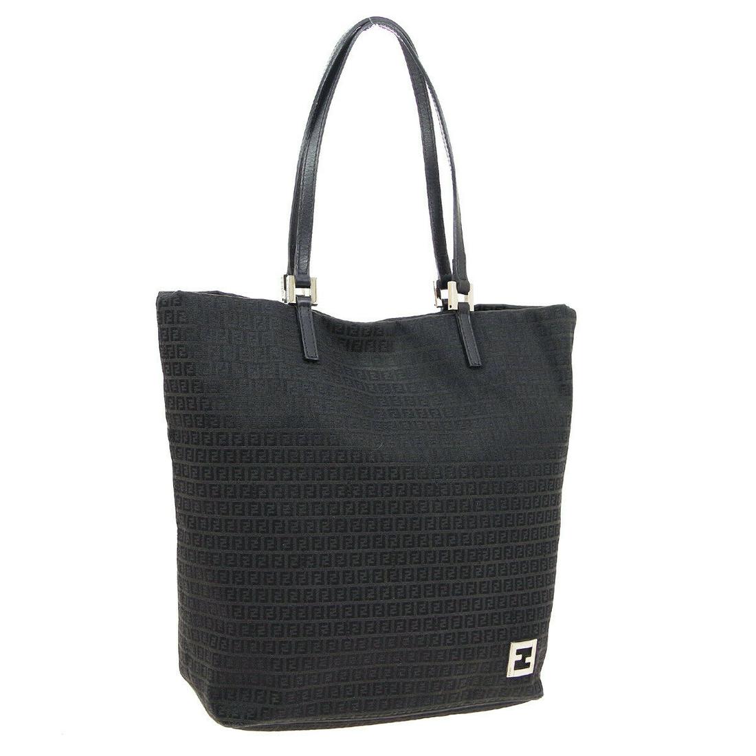 Authentic FENDI Zucchino Pattern Hand Tote: Brand: FENDI Material: Canvas, Leather Style: Tote Color: Black Size(inch): W9.6 x H11.0 x D4.7 " / Strap Drop: 7.9 Country of Origin: Italy Come with: - All Bidhaus items come with a 100% money-back
