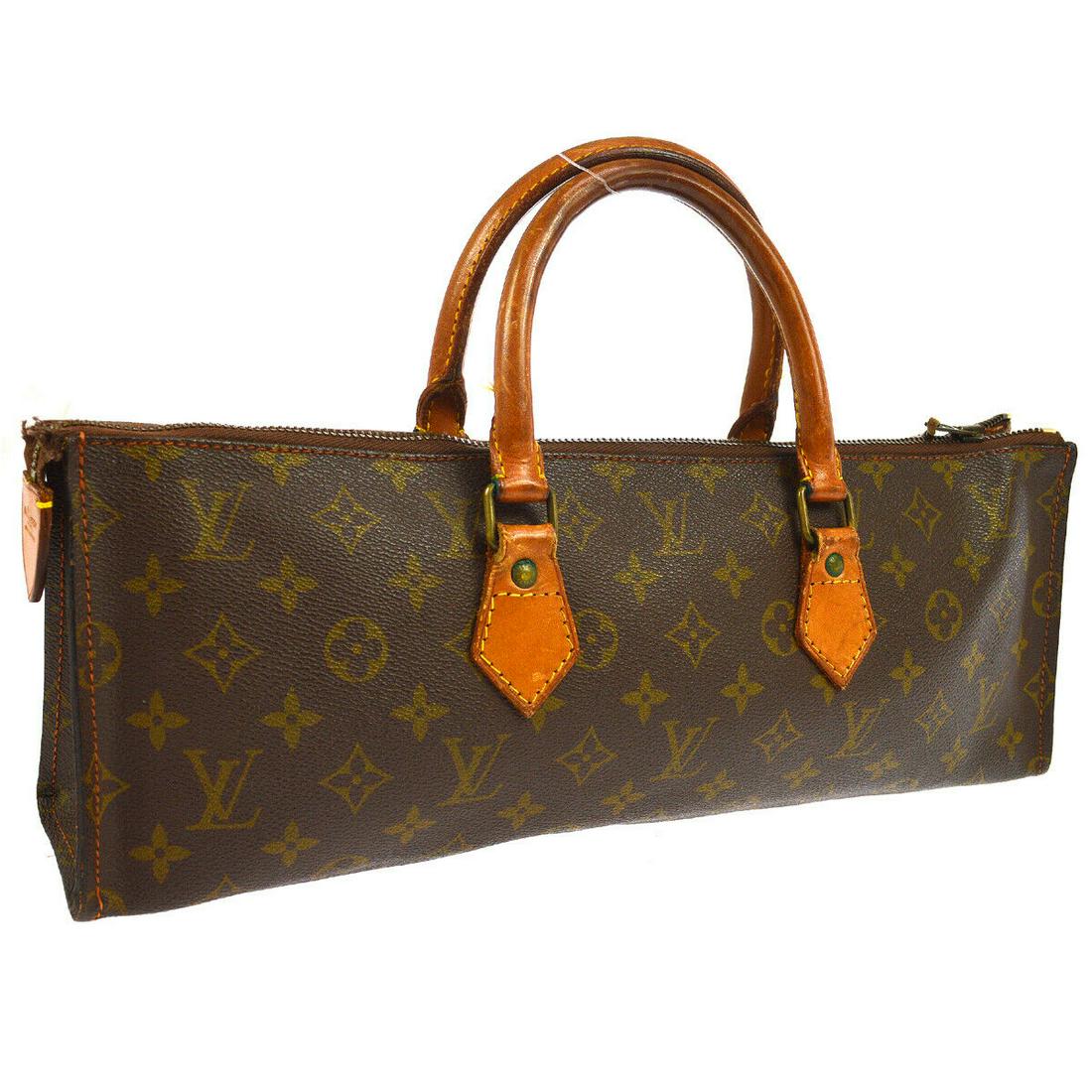 Authentic LOUIS VUITTON SAC TRIANGLE HAND BAG: Brand: LOUIS VUITTON Material: Monogram Canvas, Leather Style: Hand Bag Color: Brown Size(inch): W15.9 x H5.5 x D3.1 " Country of Origin: France Come with: - All Bidhaus items come with a 100% money-b