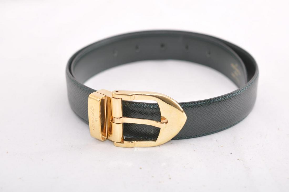Authentic LOUIS VUITTON Taiga Leather Ceinture Men's: Brand: LOUIS VUITTON Material: Taiga Leather Style: Belt Color: Episea Size(inch): Length 27.16-31.1â€³ Width 1.18â€³ (Approx) Country of Origin: France Accessory: There is no item box and dus