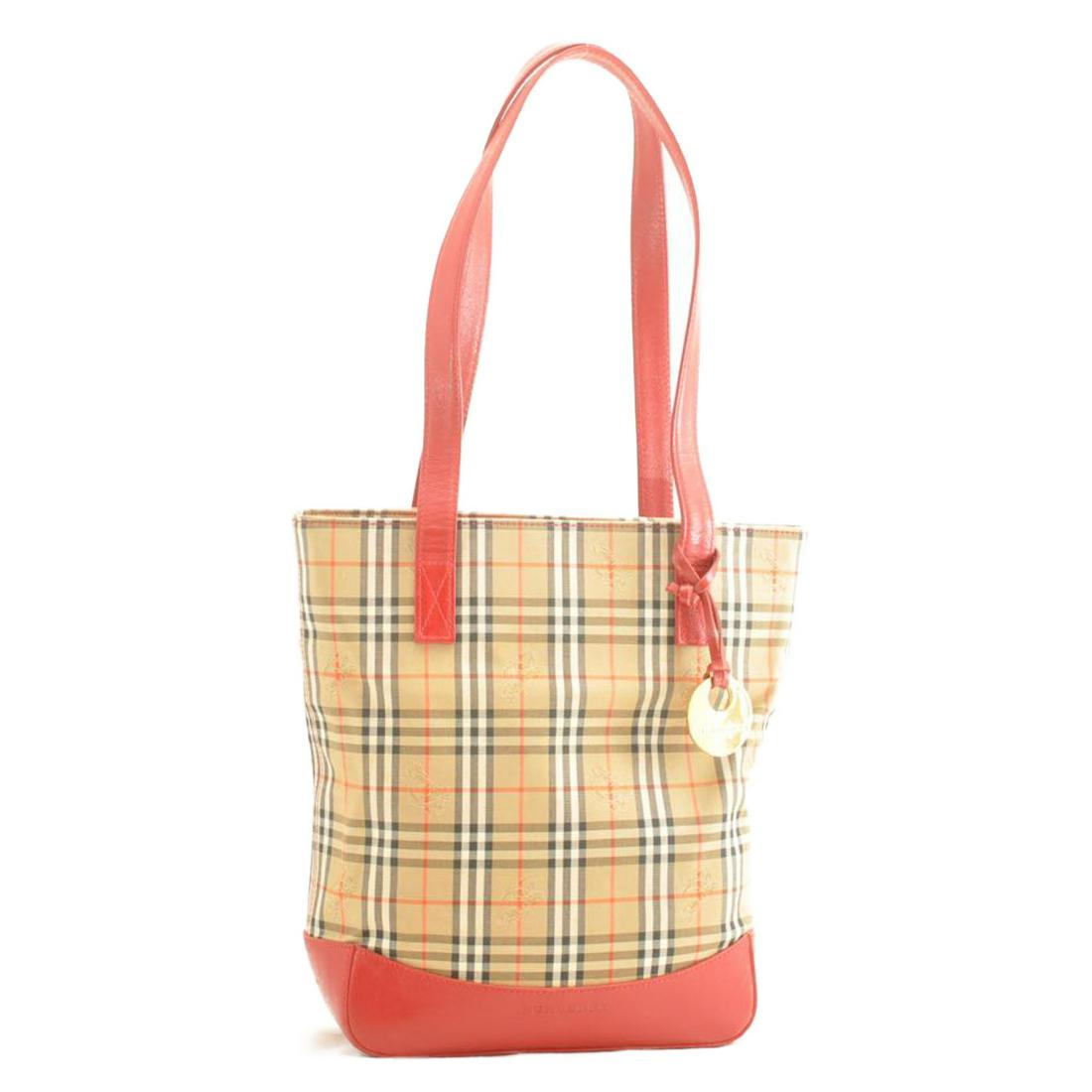 Authentic BURBERRY Nova Check Nylon Tote: Brand: BURBERRY Material: Nylon Style: Tote Bag Color: Beige Size(inch): W8.26 x H10.62 x D3.93inch(Approx) Country of Origin: â€“ Accessory: Charm All Bidhaus items come with a 100% money-back a