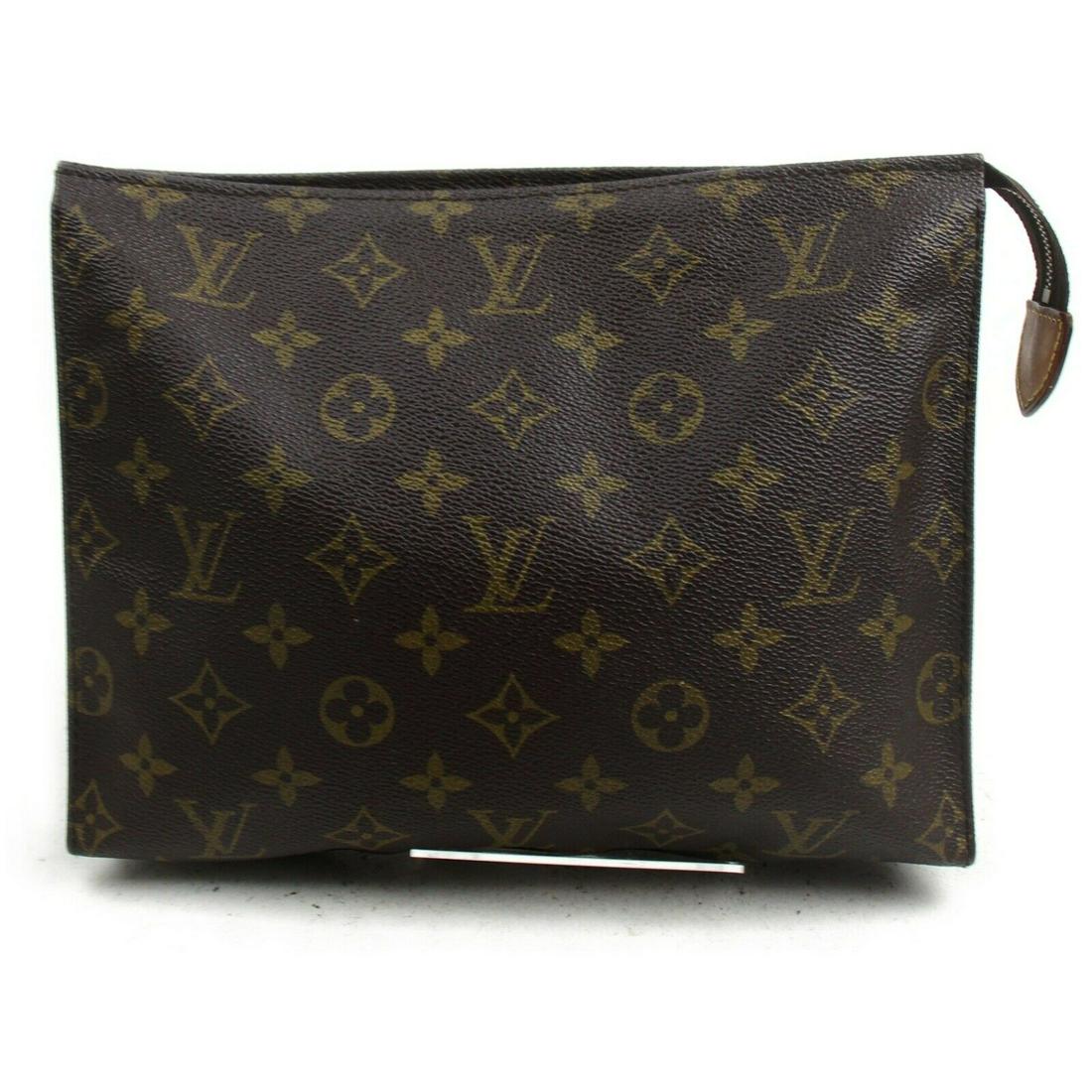 Authentic LOUIS VUITTON Monogram Cosmetic Pouch: Brand: LOUIS VUITTONMaterial: MonogramStyle: Cosmetic PouchColor: BrownsSize(inch): W10.2 inch(approx) /26 cm(approx) x H7.87 inch(approx) /20 cm(approx) x D1.96 inch(approx) /5 cm(approx) "Country of
