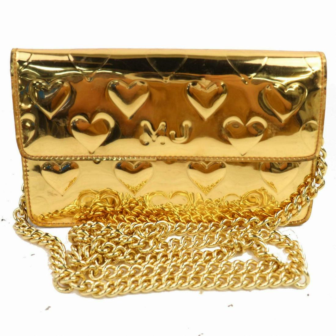 Authentic MARC JACOBS Leather Shoulder Bag: Brand: MARC JACOBSMaterial: LeatherStyle: Shoulder BagColor: GoldSize(inch): W7.48 inch(approx) /19 cm(approx) x H4.33 inch(approx) /11 cm(approx) x D1.57 inch(approx) /4 cm(approx) " / Strap Drop: Sh