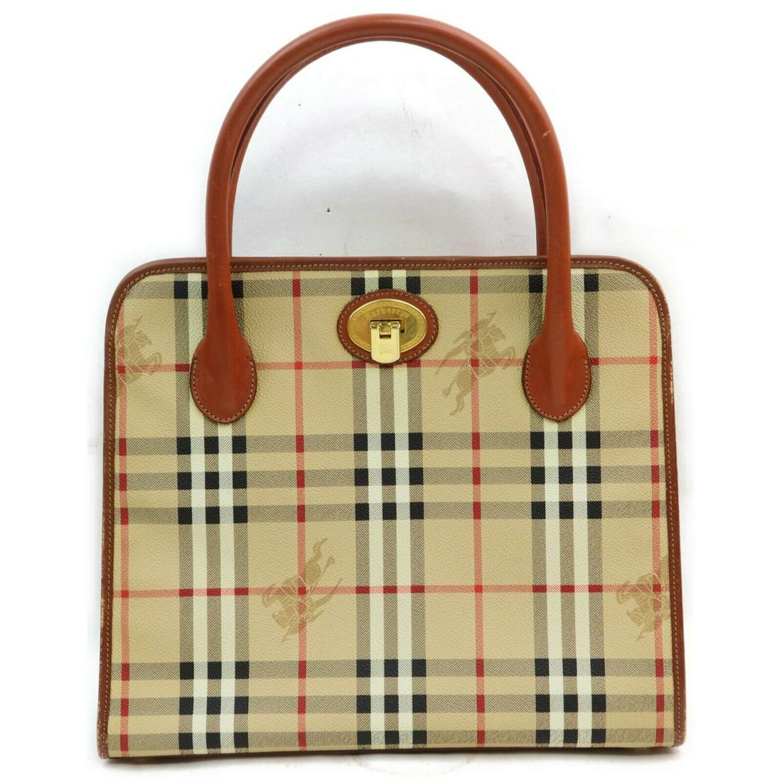 Authentic BURBERRYs PVC Hand Bag: Brand: BURBERRYsMaterial: PVCStyle: Hand BagColor: Light BrownSize(inch): W11.8 inch(approx) /30 cm(approx) x H10.2 inch(approx) /26 cm(approx) x D4.33 inch(approx) /11 cm(approx) "Country of Origin:
