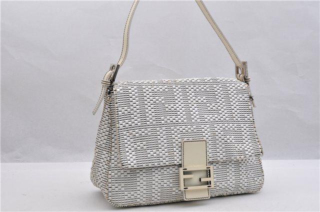 Authentic FENDI Mamma Baguette Shoulder Bag: Brand: FENDI Material: Leather Style: Shoulder Bag Color: White Size(inch): W11.4 x H8.3 x D4.7" / Strap Drop 6.3-9.1"(Approx) Country of Origin: Italy Accessory: There is no ItemBox and DustBag.We wi