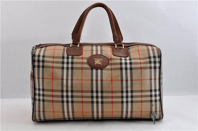 Authentic BURBERRYs Nova Check Travel Boston Bag: Brand: BURBERRYs Material: Canvas Style: Boston Bag Color: Brown/Beige Size(inch): W18.1 x H9.8 x D9.1" / Handle Drop 6.7"(Approx) Country of Origin: - Accessory: Padlock and key All Bidhaus items com