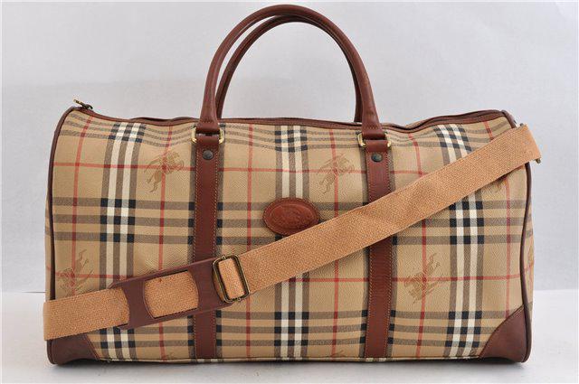 Authentic BURBERRYs Nova Check Travel Boston Bag PVC: Brand: BURBERRYs Material: PVC Style: Boston Bag Color: Brown/Beige Size(inch): W20.1 x H10.4 x D9.3" / Handle Drop 5.9"(Approx) Country of Origin: Italy Accessory: ShoulderStrap All Bidhaus items com
