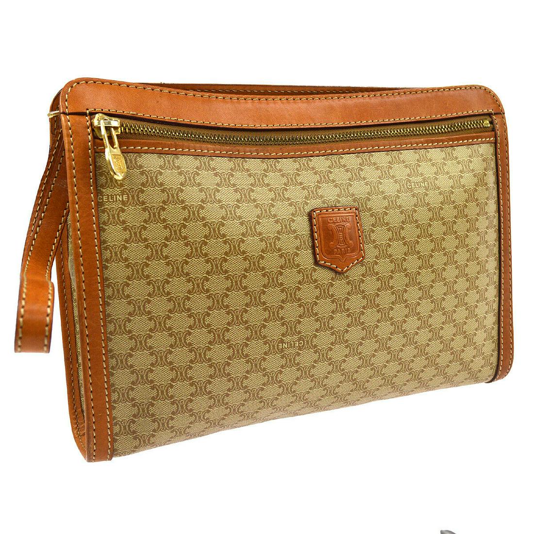 Authentic CELINE Macadam Pattern Clutch: Brand: CELINE Material: PVC, Leather Style: Clutch Color: Brown Size(inch): W10.2 x H7.9 x D2.4 " Size(inch): W 10.2 x H 7.9 x D 2.4 " Country of Origin: Italy Come with: - All Bidhaus items come with