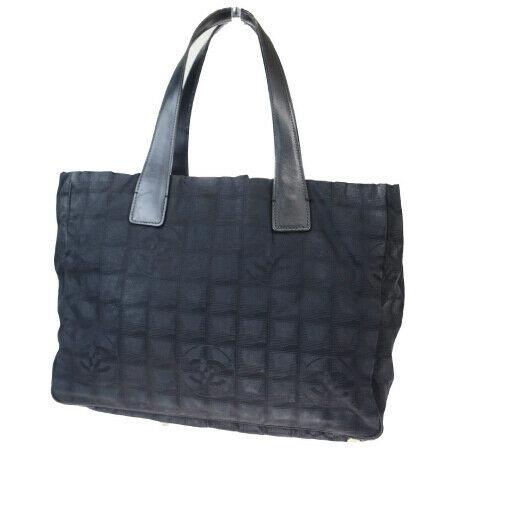 Authentic CHANEL New Travel Line MM: Brand: CHANEL Material: Jacquard, Leather Style: Tote bag Color: Black Size (HxWxD): 27cm x 34cm x 14cm / 10.62'' x 13.38'' x 5.51'' Country of Origin: Italy All Bidhaus items come with a 100% money-b