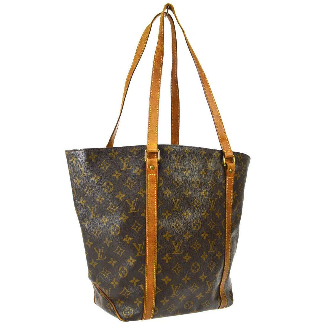 Authentic LOUIS VUITTON Sac Shopping Tote: Brand: Louis Vuitton Material: Monogram Canvas, Leather Style: Tote Color: Browns Size(inch): W15.7 x H13.0 x D5.5 " / Strap Drop: 12.6 Size(inch): W 15.7 x H 13.0 x D 5.5 " Strap Drop. 12.6 " Country