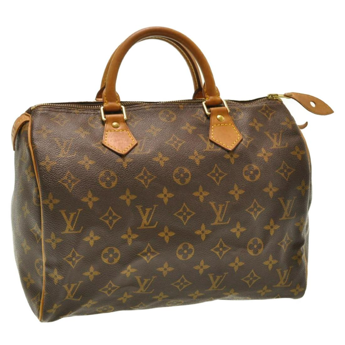 Authentic Louis Vuitton Monogram Speedy 30 Hand Bag: Brand: Louis Vuitton Style: Hand Bag Material: Monogram Canvas Color: Monogram Made In: France Size (Inches): W12 X H9 X D6.5"(Approx) Exterior Condition: Monogram Canvas : minor loose Shape, RubbingL