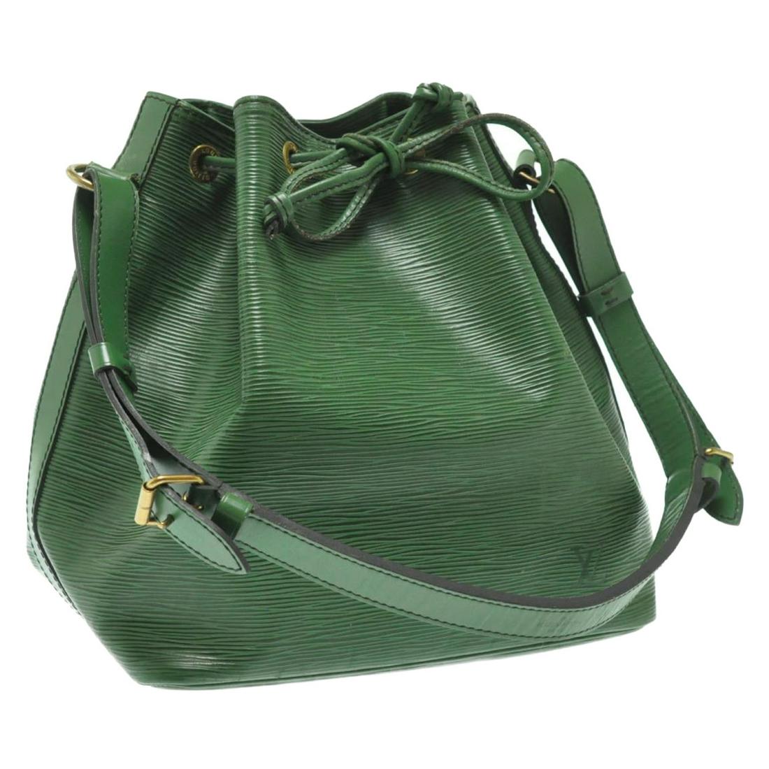 Authentic Louis Vuitton Epi Petit Noe Shoulder Bag: Brand: Louis Vuitton Style: Shoulder Bag Material: Epi Leather Color: Green Made In: France Size (Inches): W9.8 X H10.6 X D7.4"(Approx) Exterior Condition: Epi Leather : loose Shape, Wrinkle, Rubbing 