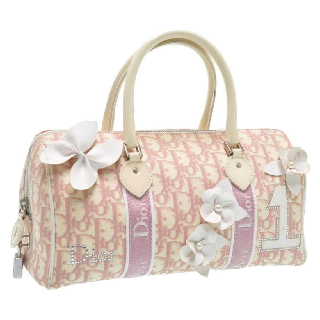 Authentic CHRISTIAN DIOR Flower Trotter Canvas Hand Bag: Brand: CHRISTIAN DIOR Material: Canvas Style: Hand Bag Color: Pink Size(inch): W11.02 x H5.51 x D5.11inch(Approx) Country of Origin: Italy Accessory: There is no item box and dust bag. We will send on