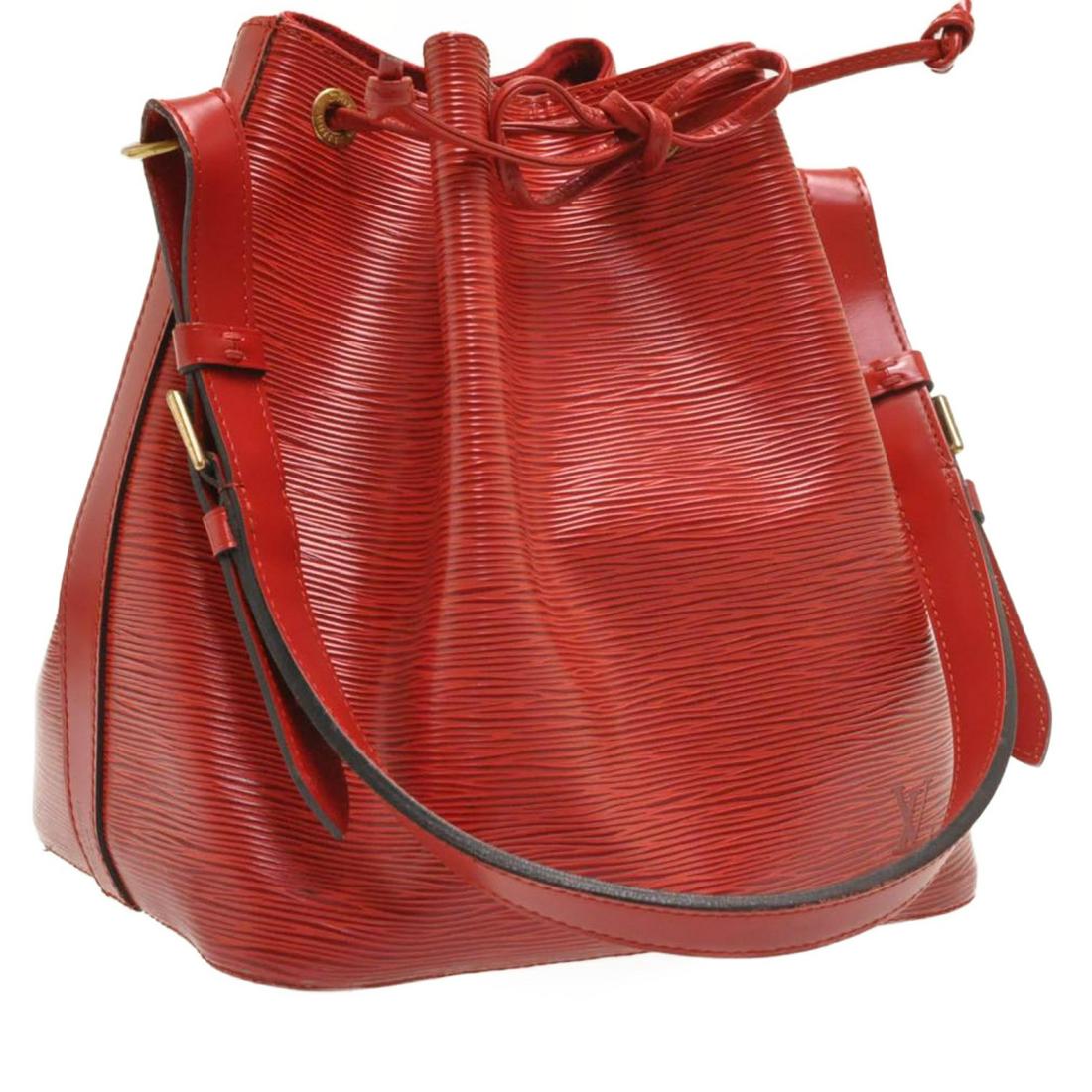 Authentic LOUIS VUITTON Epi Petit Noe Shoulder Bag: Brand: LOUIS VUITTON Material: Epi Leather Style: Shoulder Bag Color: Red Size(inch): W9.8 x H10.6 x D7.4â€³(Approx) Country of Origin: France Accessory: Dust Bag All Bidhaus items come with a 100