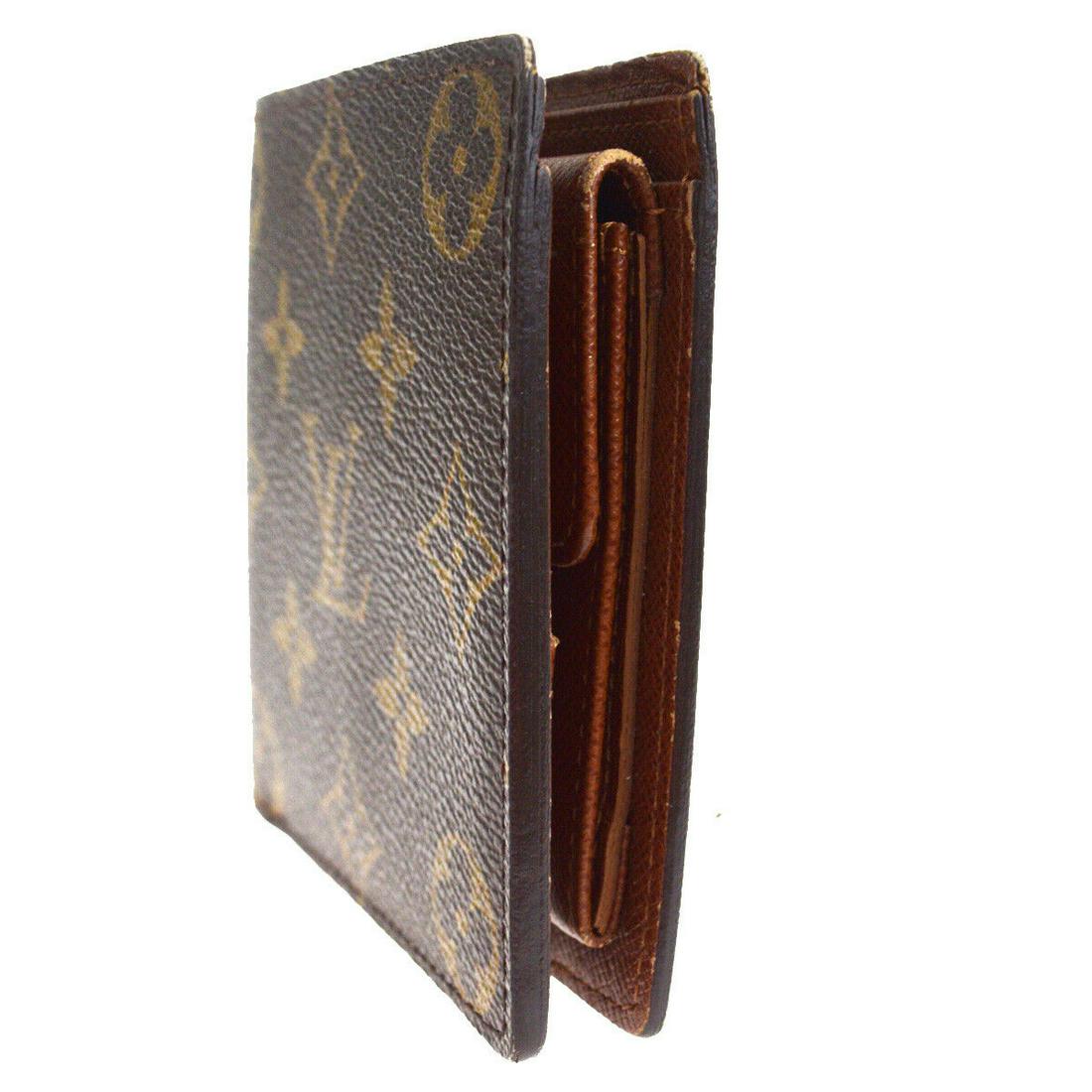Authentic LOUIS VUITTON Monogram Leather Wallet: Brand: LOUIS VUITTON Material: Monogram Leather Style: Wallet Color: Brown Size(inch): W 4.1 x H 3.9 x D 0 "(approx.) Country of Origin: France Come with: - All Bidhaus items come with a 100% money-ba