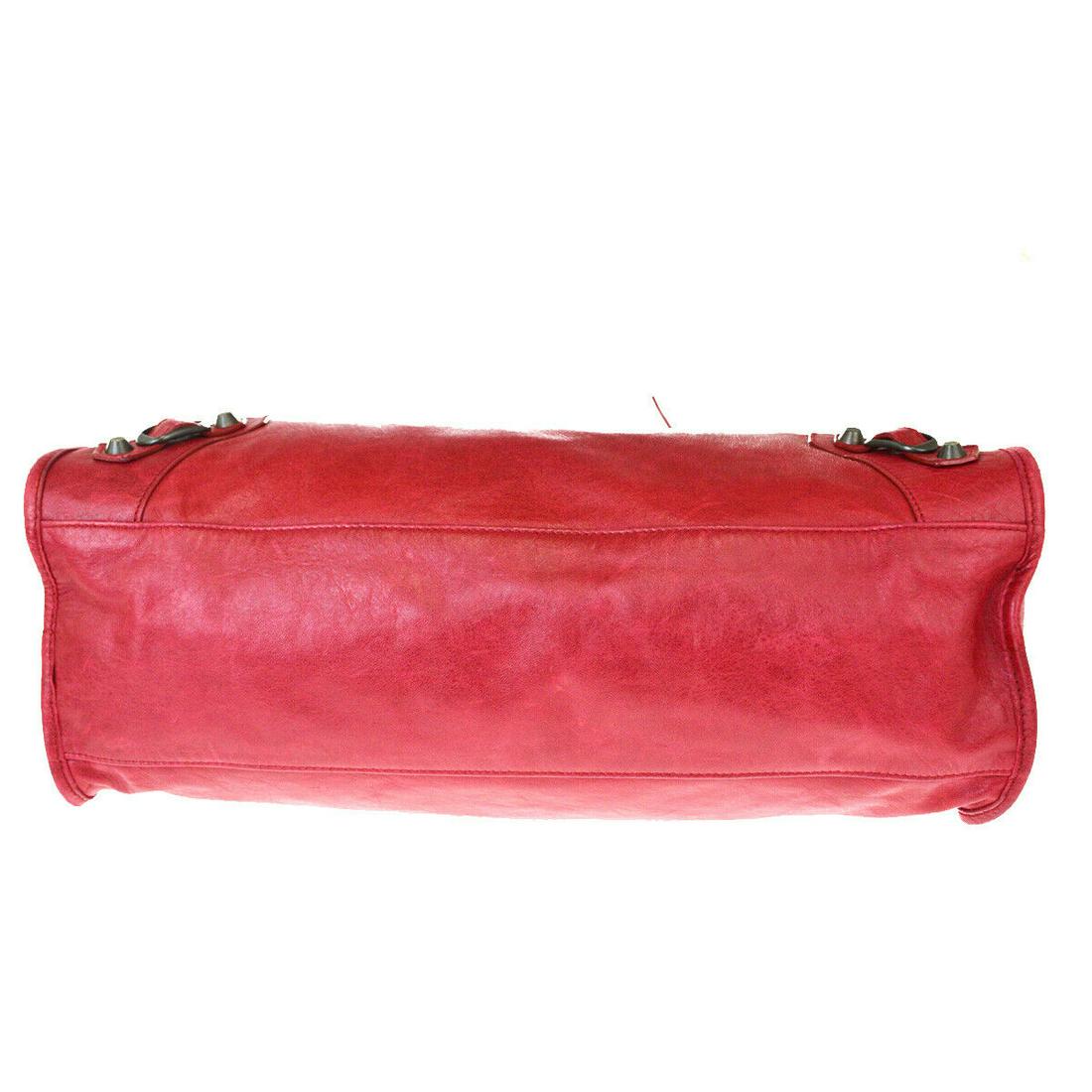 Authentic BALENCIAGA Leather Hand Bag: Brand: BALENCIAGA Material: Leather Style: Hand Bag Color: Red Size(inch): W 14.6 x H 9.4 x D 5.1 "(approx.) Country of Origin: Italy Come with: - All Bidhaus items come with a 100% money-back authent