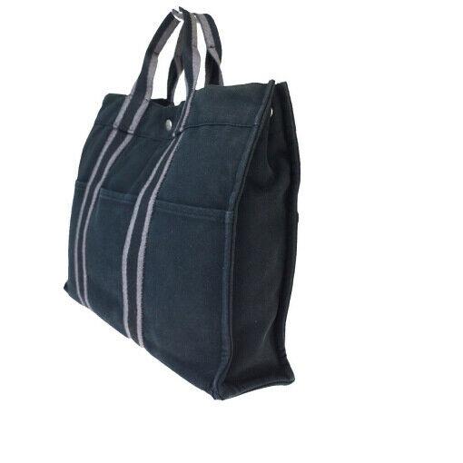 Authentic HERMES Canvas Tote bag: Brand: HERMES Material: Canvas Style: Tote bag Color: Black Size (HxWxD): 31cm x 42cm x 10cm / 12.2'' x 16.53'' x 3.93'' Country of Origin: France All Bidhaus items come with a 100% money-back authent