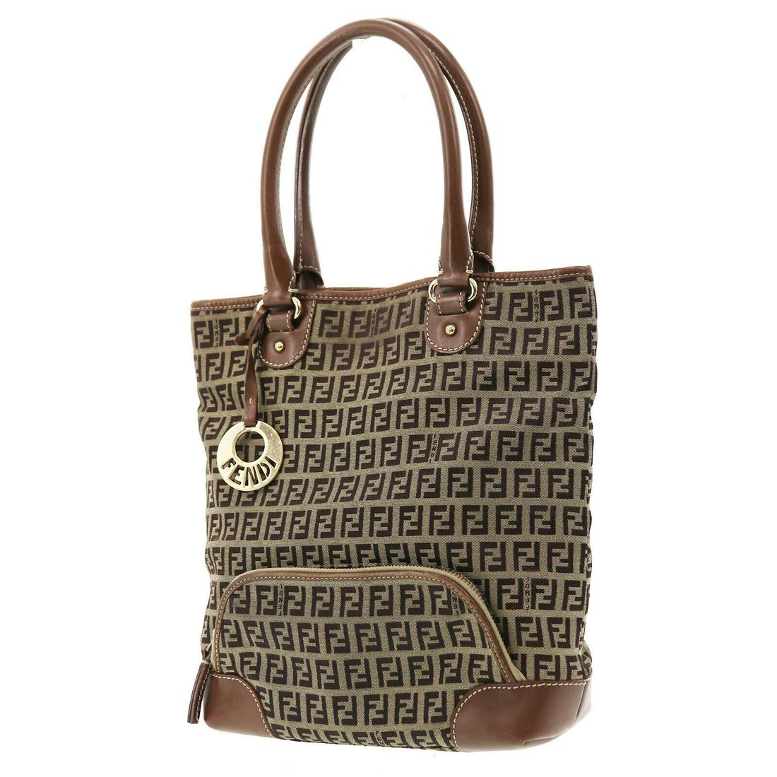 Authentic FENDI Zucca Pattern Hand Bag: Brand: Fendi Material: Canvas Style: Hand Bag Color: Brown Size(Inch): H 10.6 x D 3.5 x L 9.0 Handle : 15.7 Country of Origin: Italy Come with: - All Bidhaus items come with a 100% money-back authenti